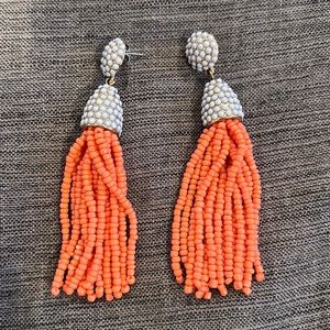 Coral and white beaded tassel earrings